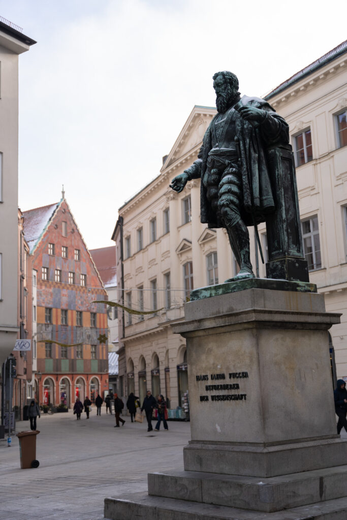 Fuggerei Statue in Augsburg, Photo by Alex Lau