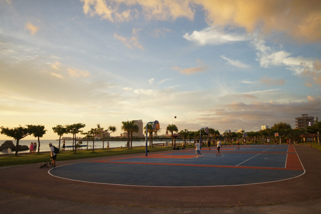 Basketball courts during sunset in Okinawa, photo by Alex Lau