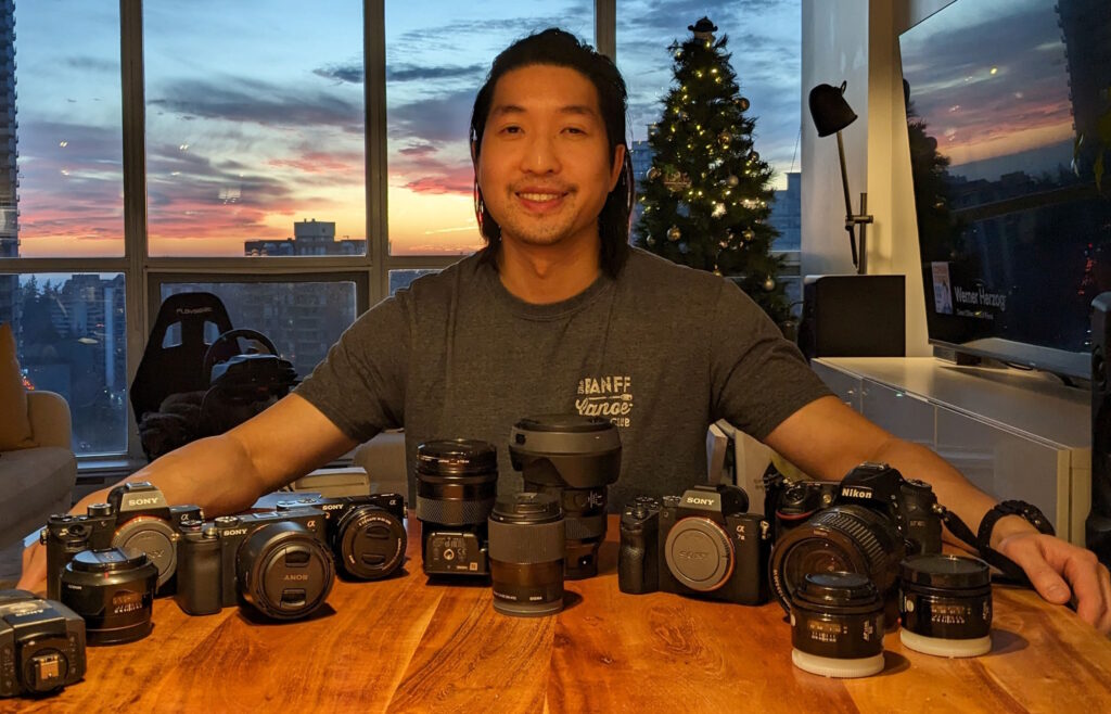 Alex Lau with all his lenses and bodies, at the time.