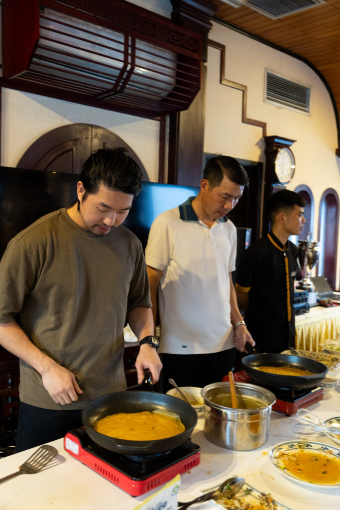 Banh xeo cooking part of the Indochina Junk Cruise, photo by Alex Lau