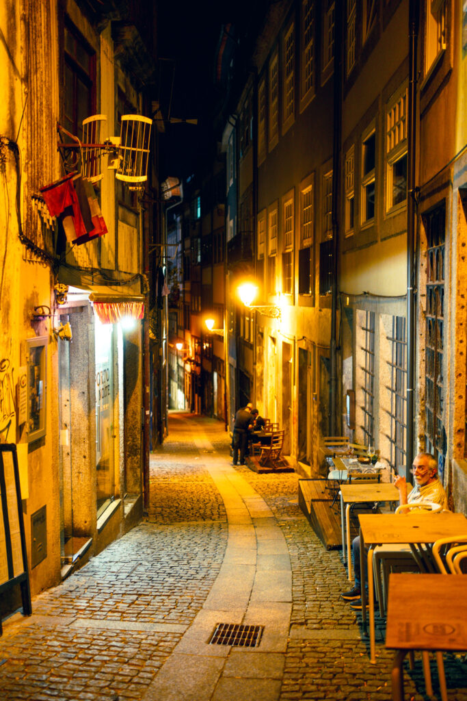 Alley in Porto playing fado, photo by Alex Lau