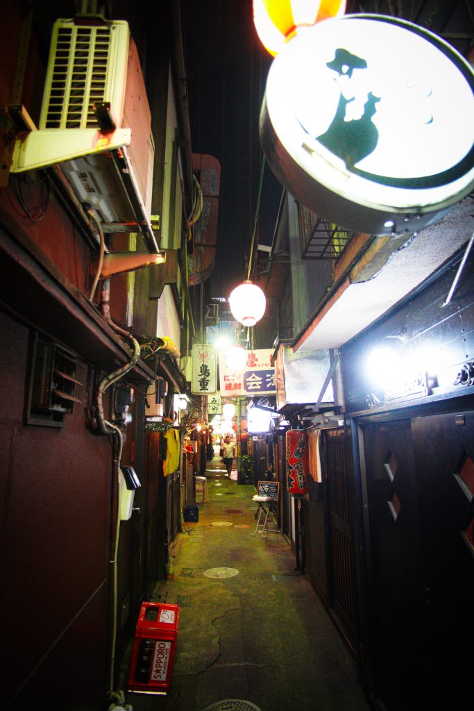 Shibuya at night photo by Alex Lau