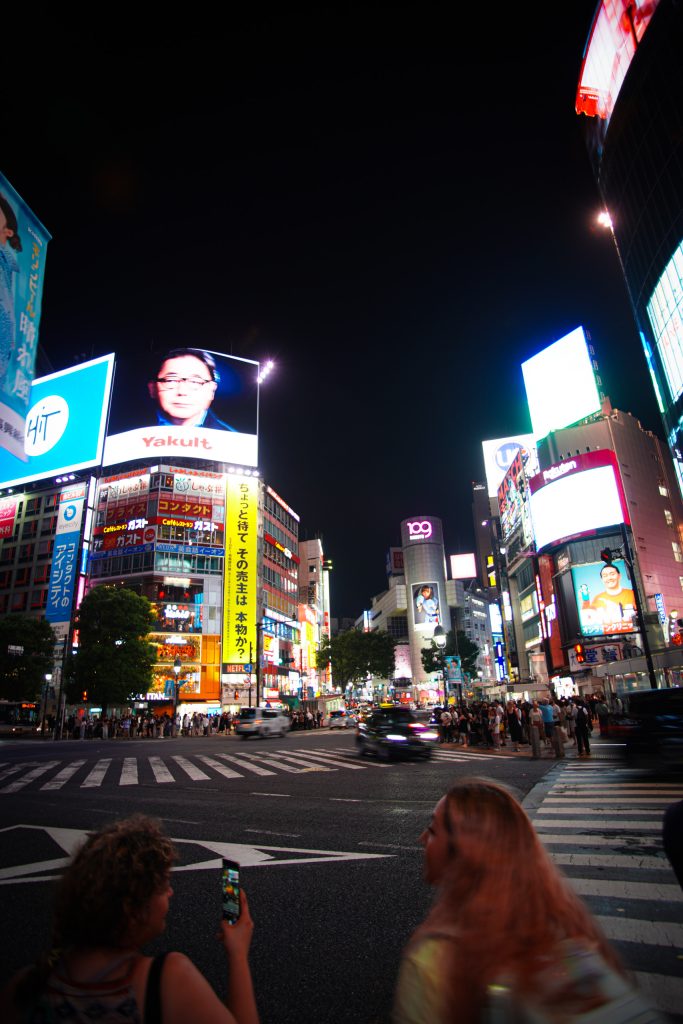 Shibuya at night photo by Alex Lau